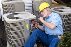 Man repairing air conditioner